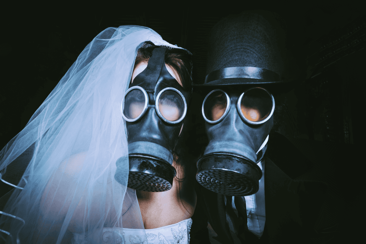Gas mask costumes for unusual wedding or event at The Solemn Sir, dark themed attire, mysterious bridal and groom masks, avant-garde wedding fashion, unique wedding photo inspiration.