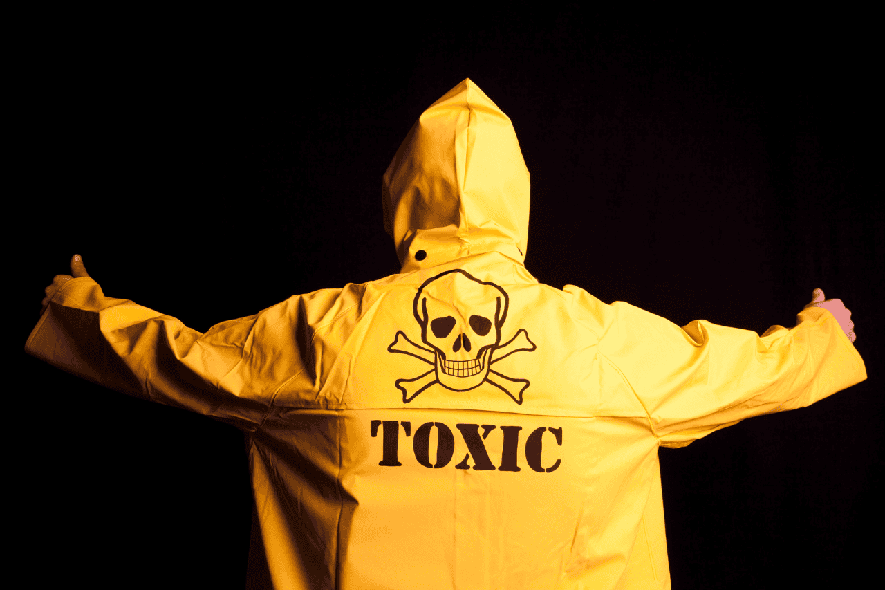 Toxic hazard warning jacket with skull and crossbones design, warning about poison or danger, bright yellow raincoat symbolizing safety alert, apparel for hazard communication, The Solemn Sir.